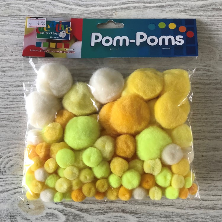 Pompons assorti geel